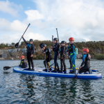 Mega SUP fun with Children's Sailing Trust